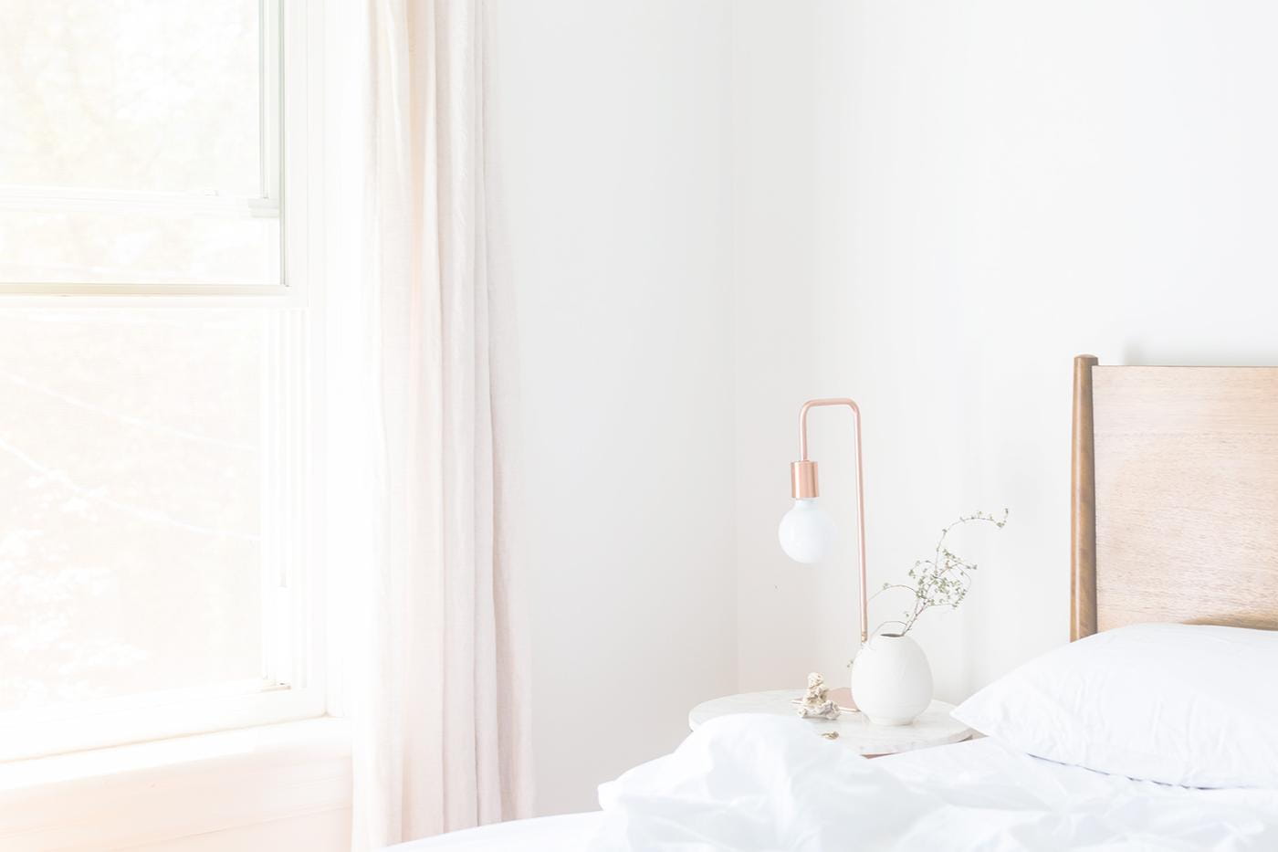 A very bright room with sun pouring in through a window.